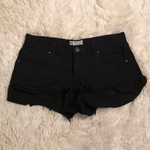 Free People black denim shorts